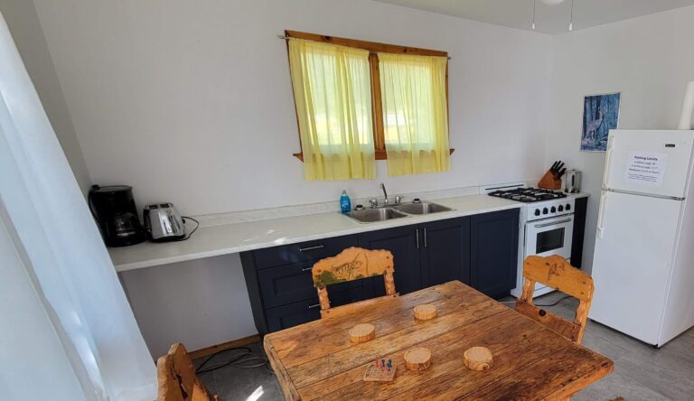 A bright, cozy dining area in a smaller cabin of ours. Comfort is key!